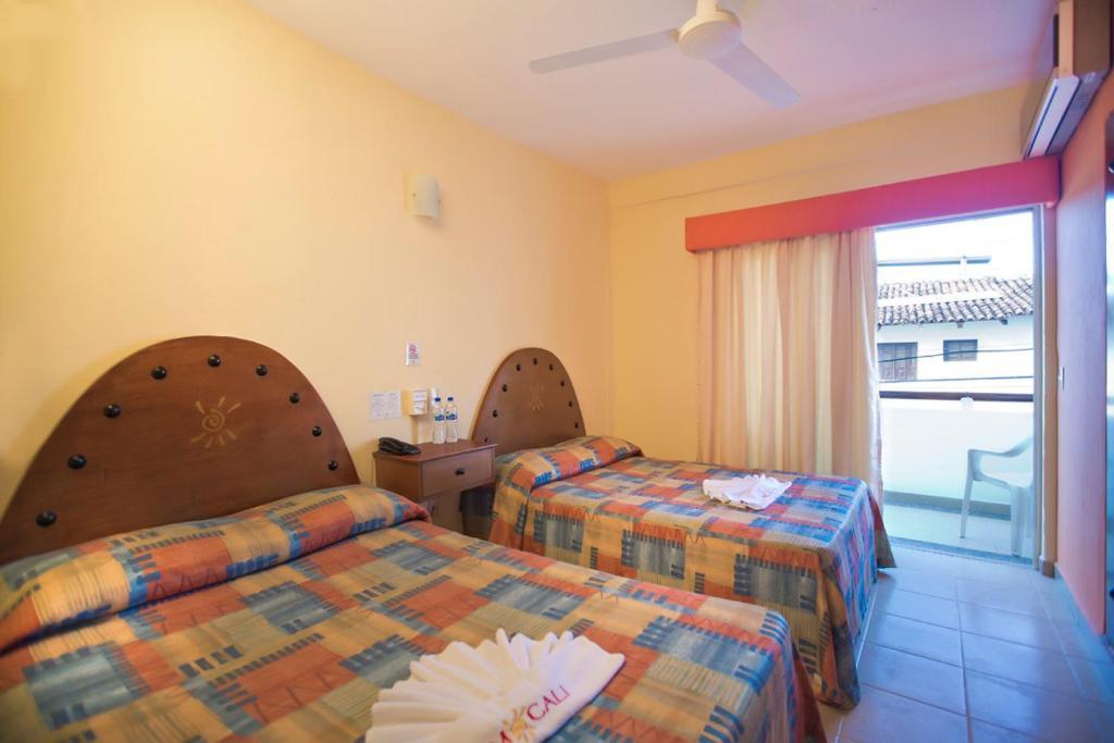 Mocali Hotel ปูแอร์โตบาญาร์ตา ห้อง รูปภาพ